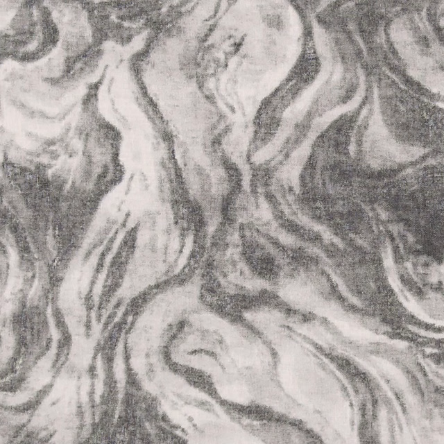 Charcoal sheer fabric with pale grey swirling marbled bands and a softly textured surface