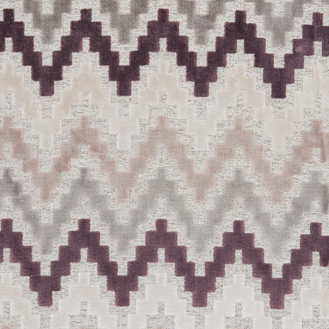 Empire Damson textile showing plum stepped zigzags over blush, grey and ivory ground