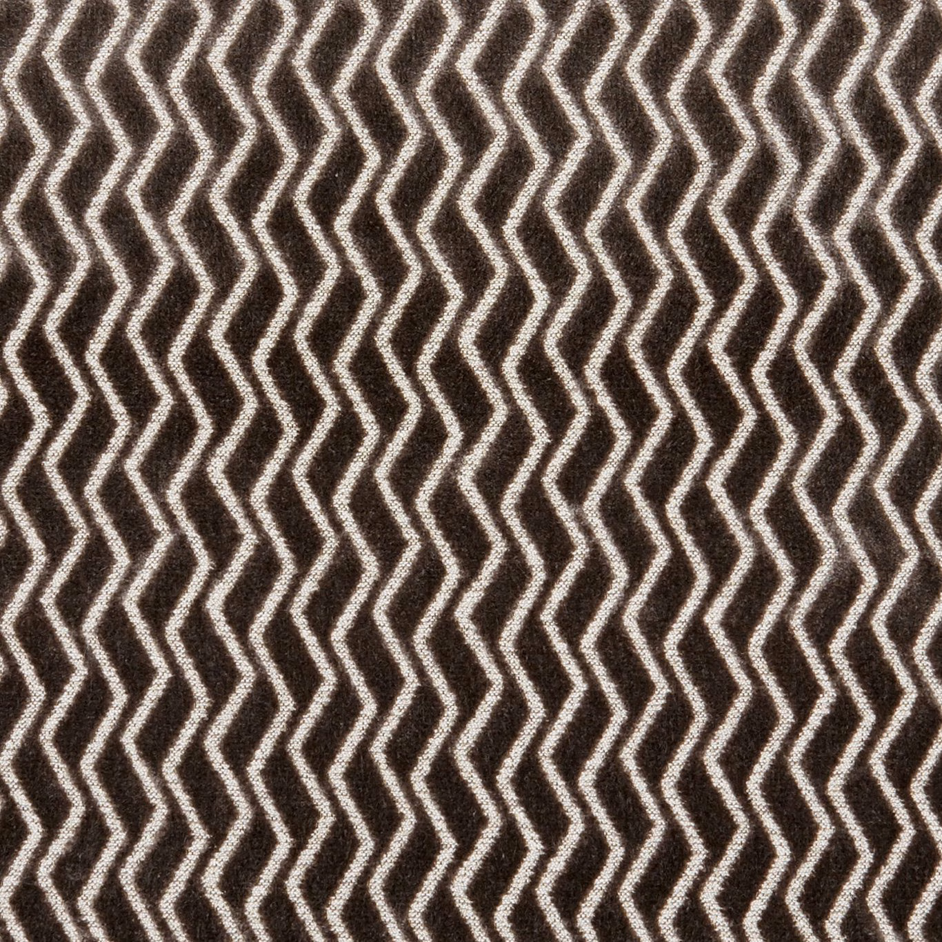 Charcoal woven fabric with repeating ivory zigzag lines and softly nubby texture