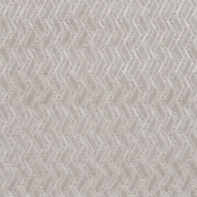 Soft ivory upholstery fabric with closely spaced taupe undulating wave lines