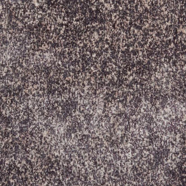 Deep damson plum upholstery with pale flecks and a dense, streaked texture