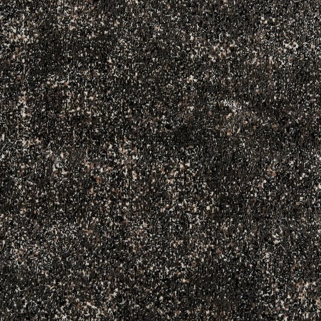 Charcoal-black Stucco Ebony textile with dense cream and taupe flecks in a nubby weave