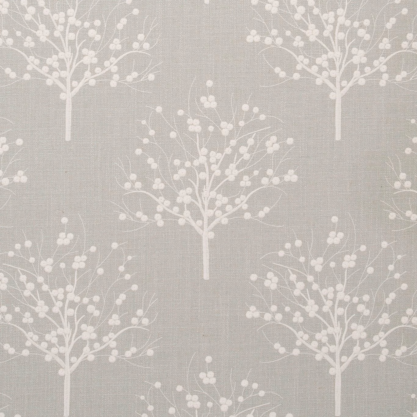 Muted duckegg blue-grey fabric with repeating white blossom trees and woven texture