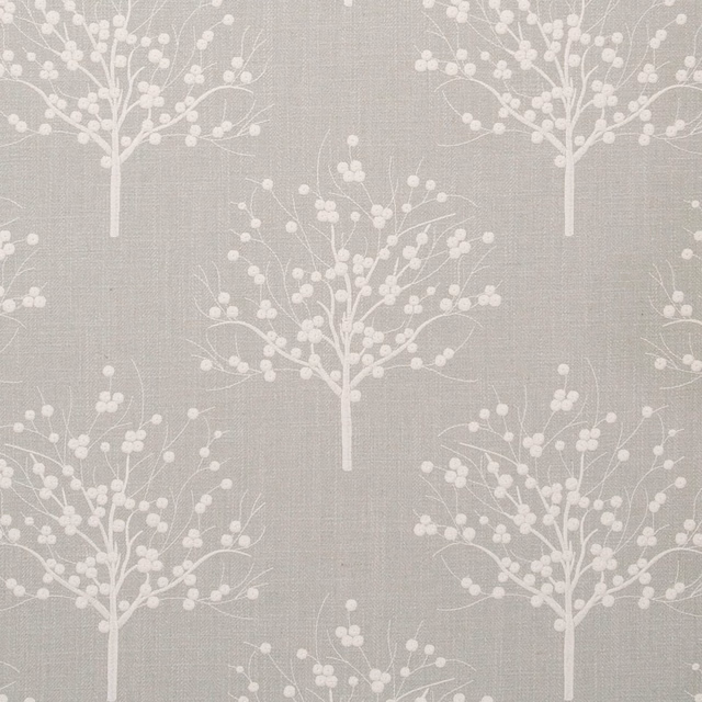 Muted duckegg blue-grey fabric with repeating white blossom trees and woven texture