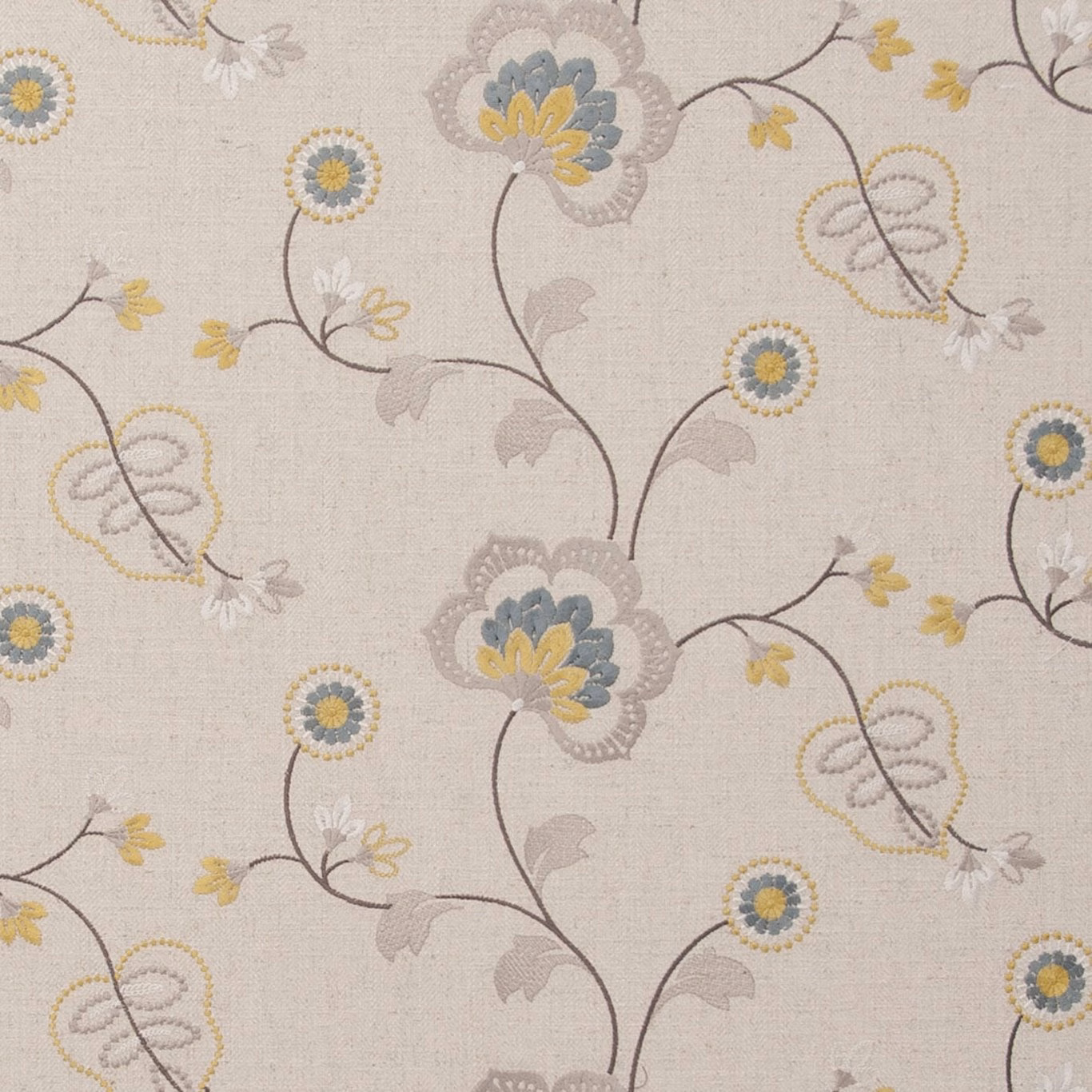 Cream woven fabric with dusty blue, ochre and taupe floral trails