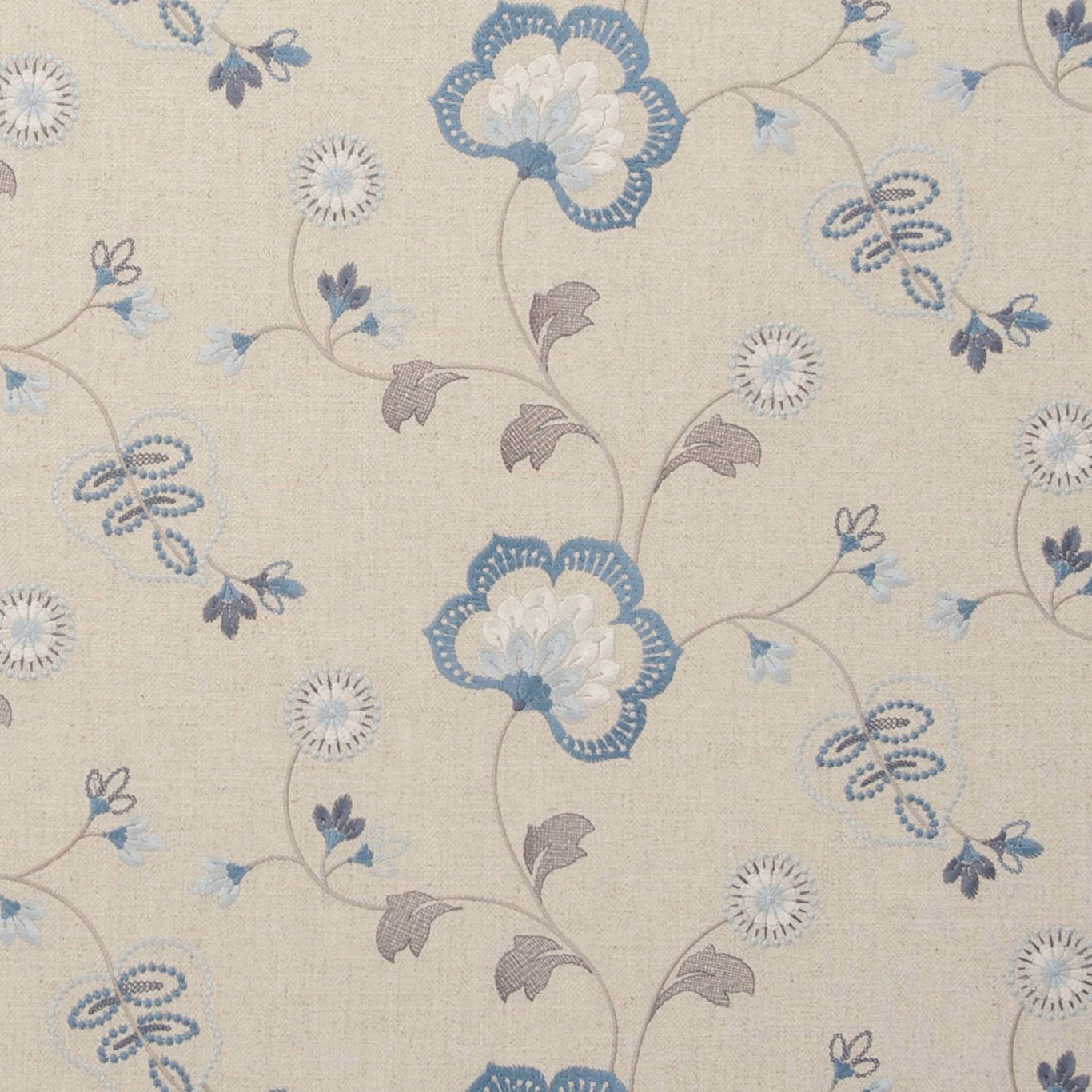 Pale blue floral vines and taupe leaves woven across a soft beige ground