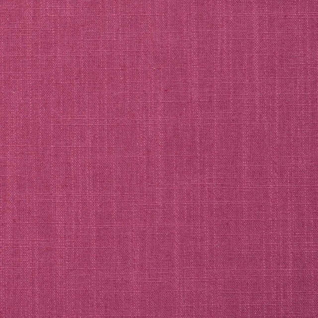 Close-up of Easton Raspberry’s saturated pink woven texture with subtle crosswise slubs