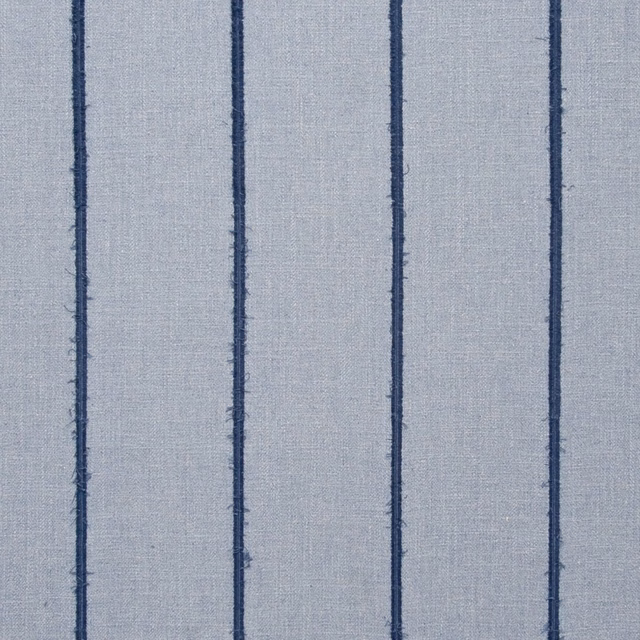Pale blue-grey woven chambray with narrow irregular navy vertical stripes