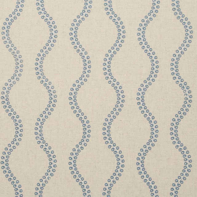 Blue-grey looping dotted bands over a warm beige woven ground