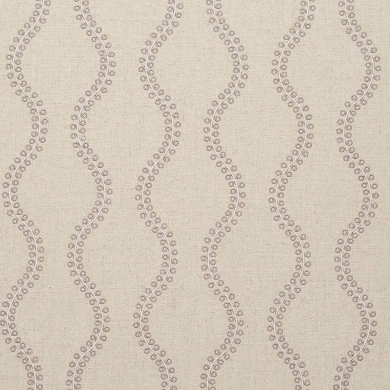Taupe woven fabric with looping dotted lines and a softly textured ground