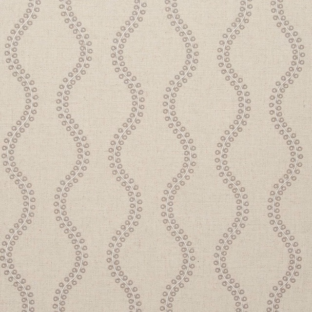 Taupe woven fabric with looping dotted lines and a softly textured ground