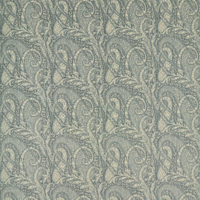 Muted eau de nil green woven fabric with cream paisley and curling leaf motifs
