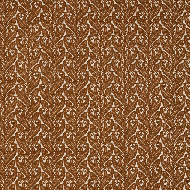 Close view of russet brown woven paisleys with cream scrolling foliage details