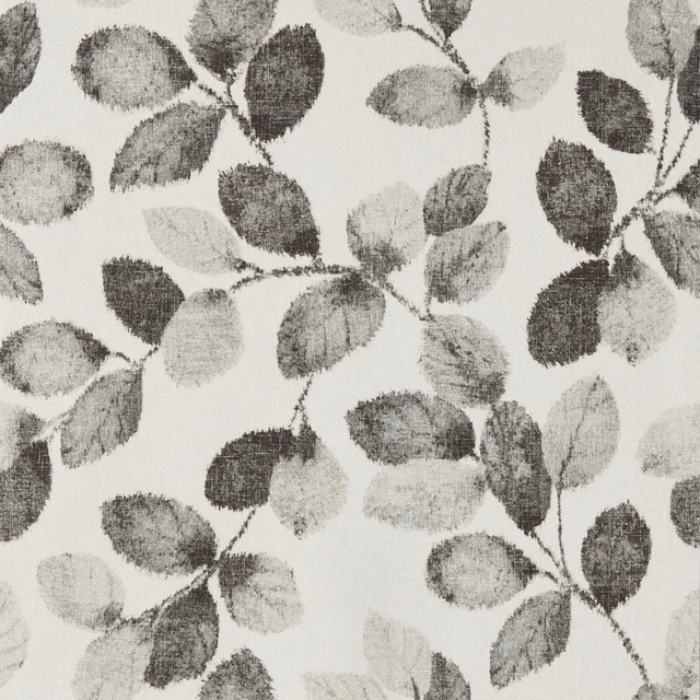 Charcoal and pale grey leafy branches scattered across an ivory wallpaper ground