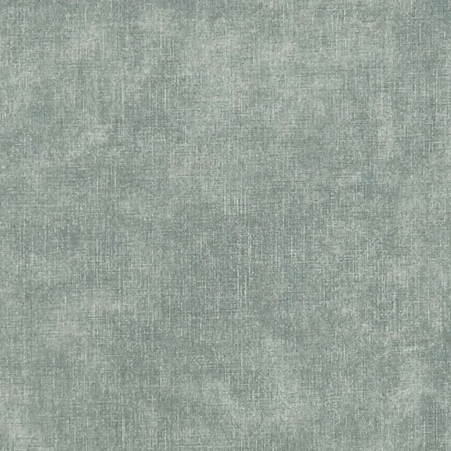 Close-up of pale sage-grey Martello fabric with irregular crosshatched woven texture