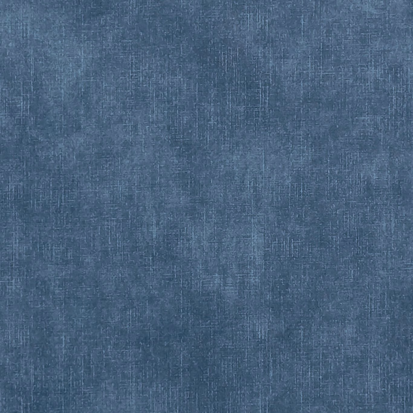 Cool indigo-blue textile with fine crosshatched threads and softly mottled woven texture