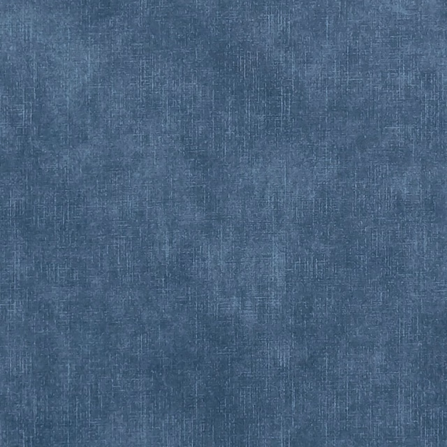 Cool indigo-blue textile with fine crosshatched threads and softly mottled woven texture
