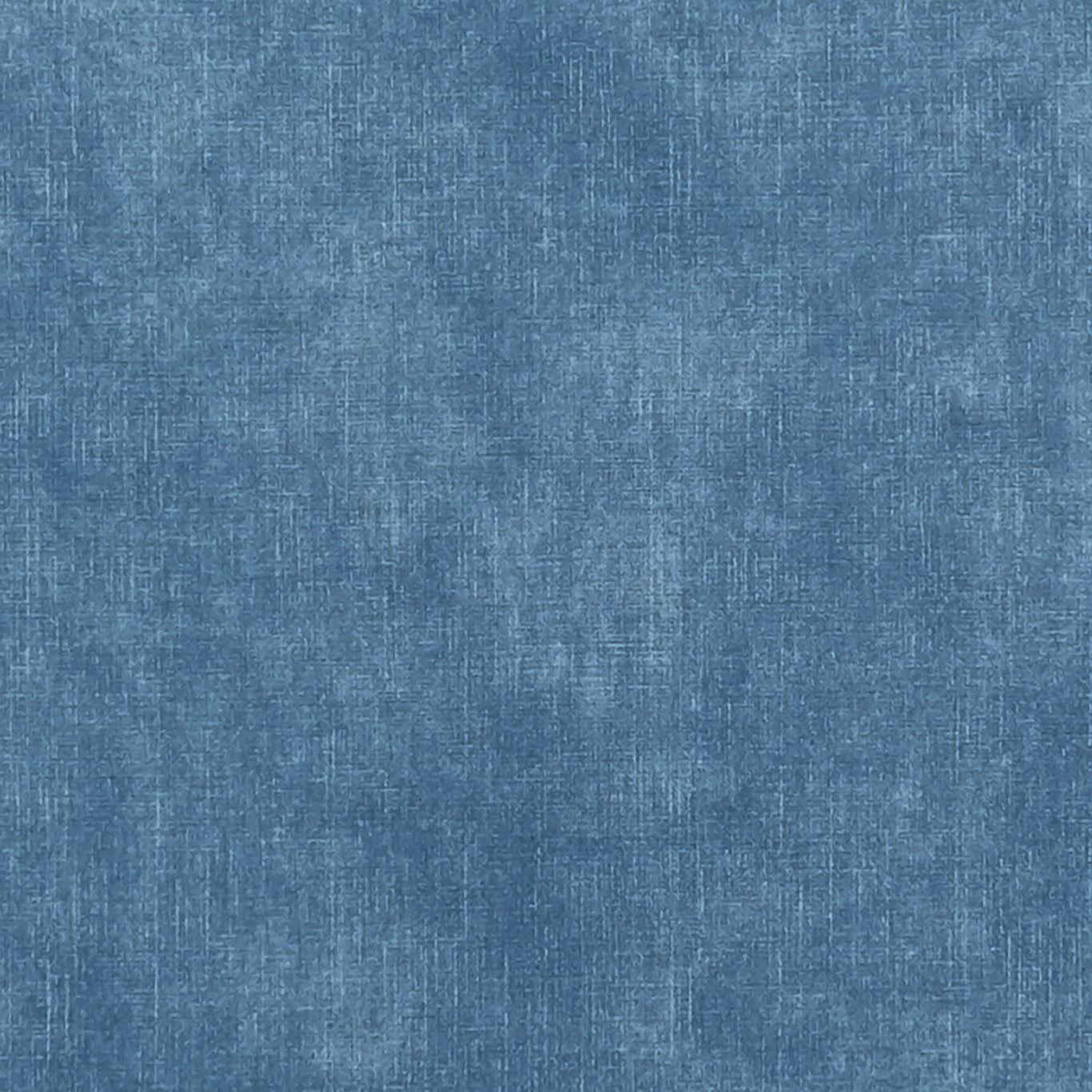 Close-up of muted ocean-blue woven fabric with subtly mottled vertical texture