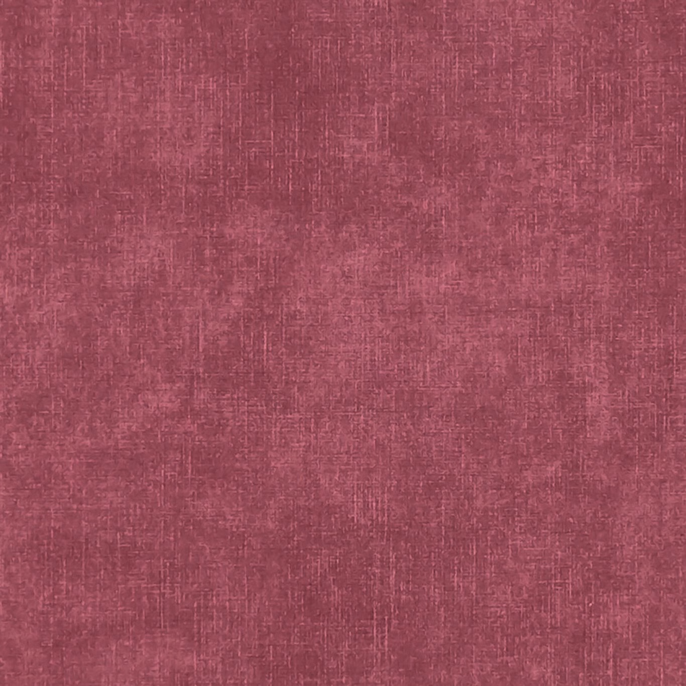 Deep raspberry pink fabric with irregular crosshatched woven texture