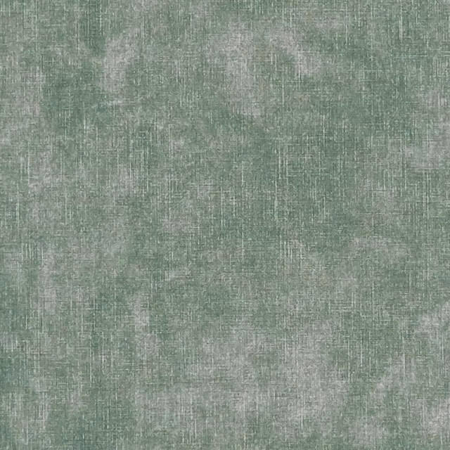 Muted sage green woven fabric with pale grey-green flecks and fine crosshatched texture