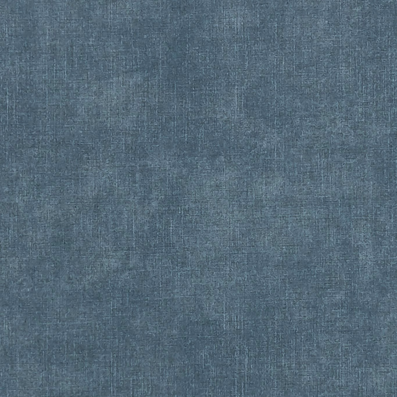 Close-up of mottled blue-grey textile with a fine teal crosshatch weave