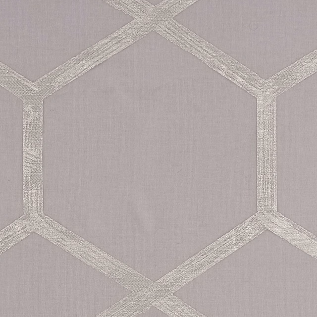Cool charcoal-grey textile with silver raised hexagonal lattice and fine woven texture