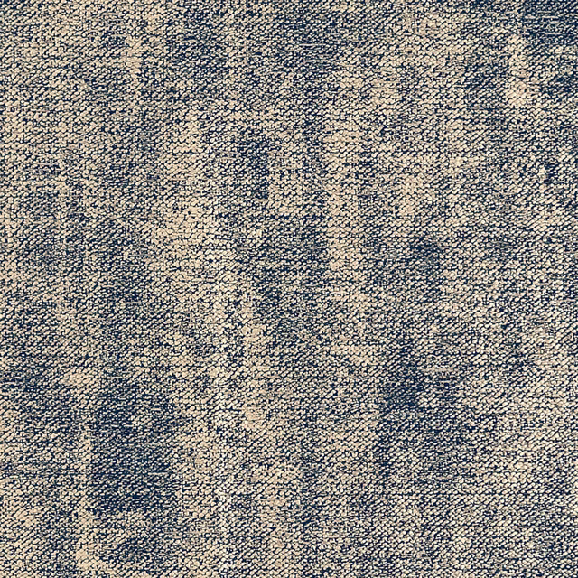Close-up of midnight blue and gold woven fabric with mottled vertical texture