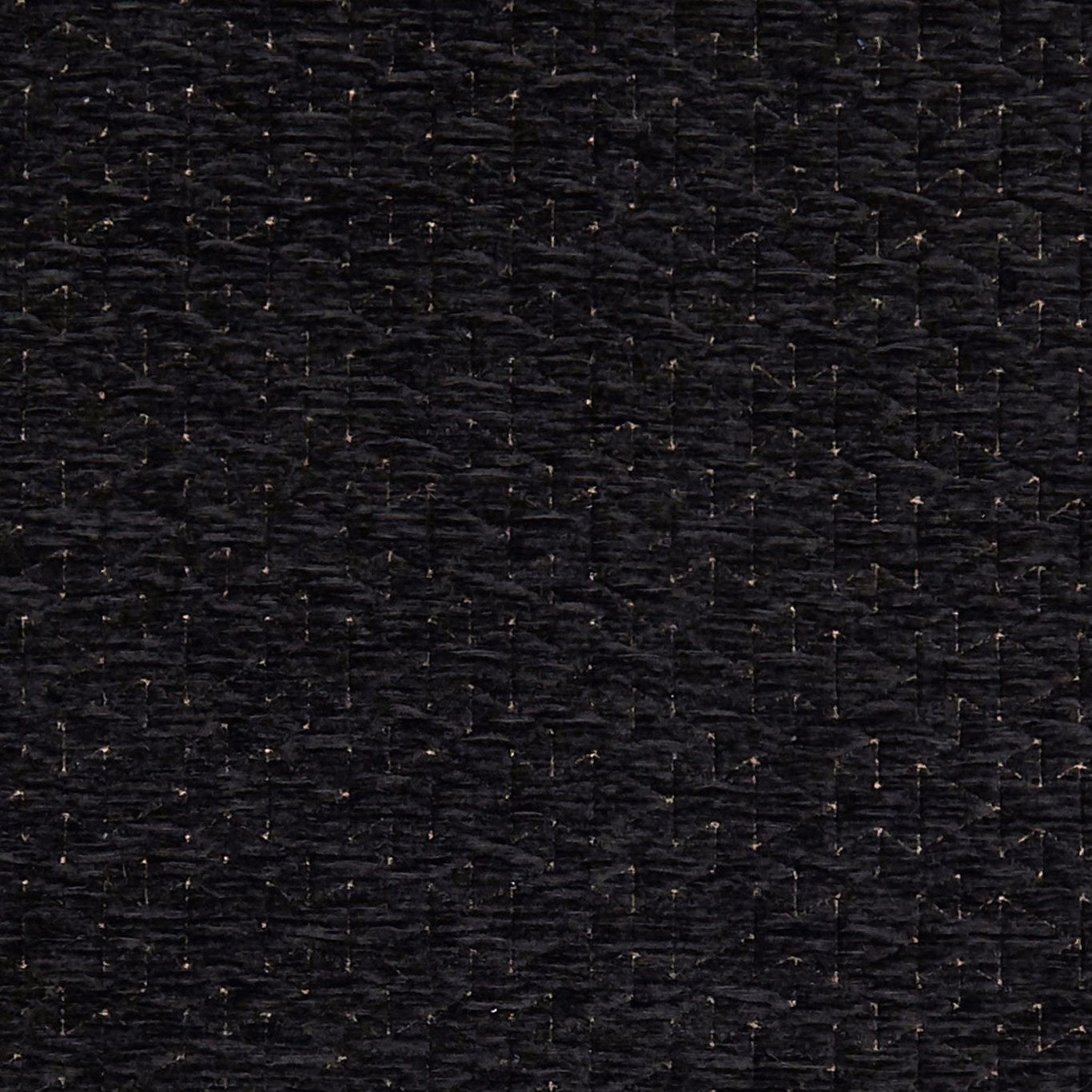 Near-black Quarzo Ebony fabric with irregular charcoal weave and fine metallic flecks
