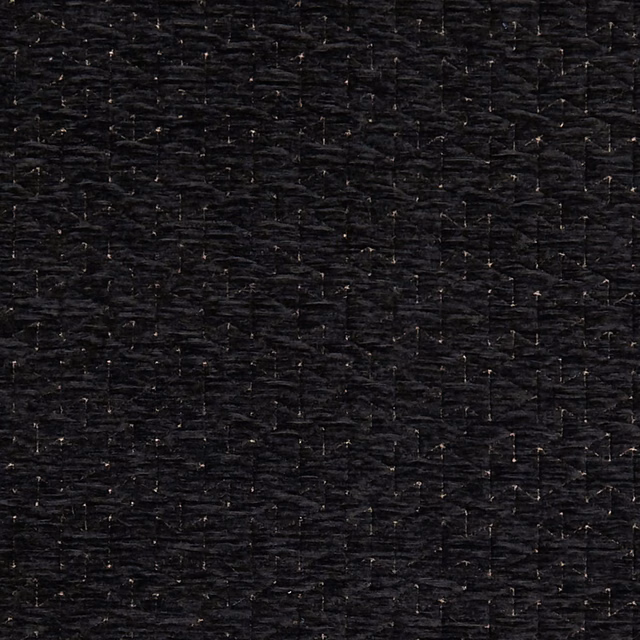 Near-black Quarzo Ebony fabric with irregular charcoal weave and fine metallic flecks