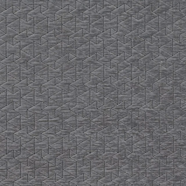 Cool slate-grey woven fabric with fine angular linked geometry and subtle surface texture