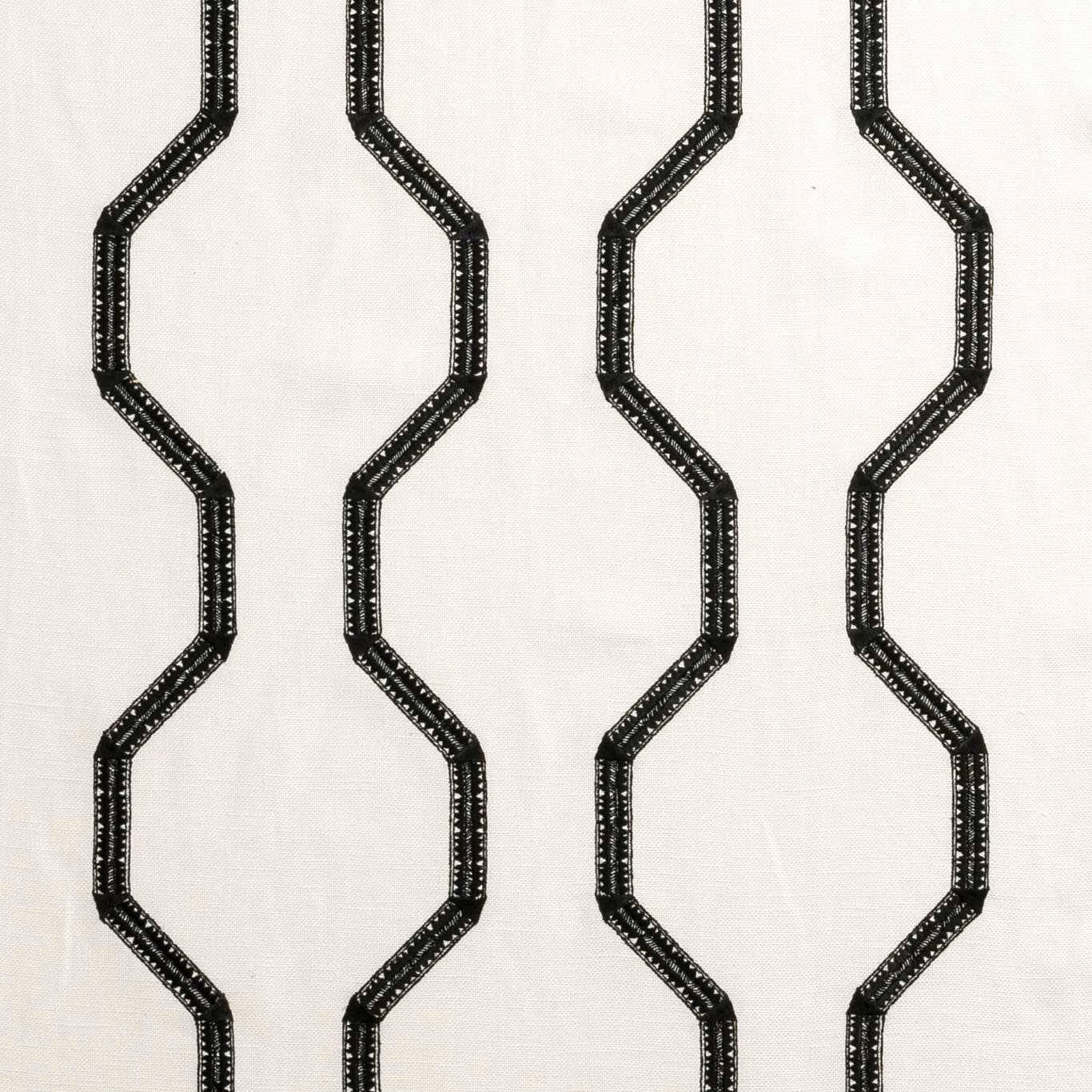 Ivory woven fabric with near-black angular chain bands in a vertical repeat