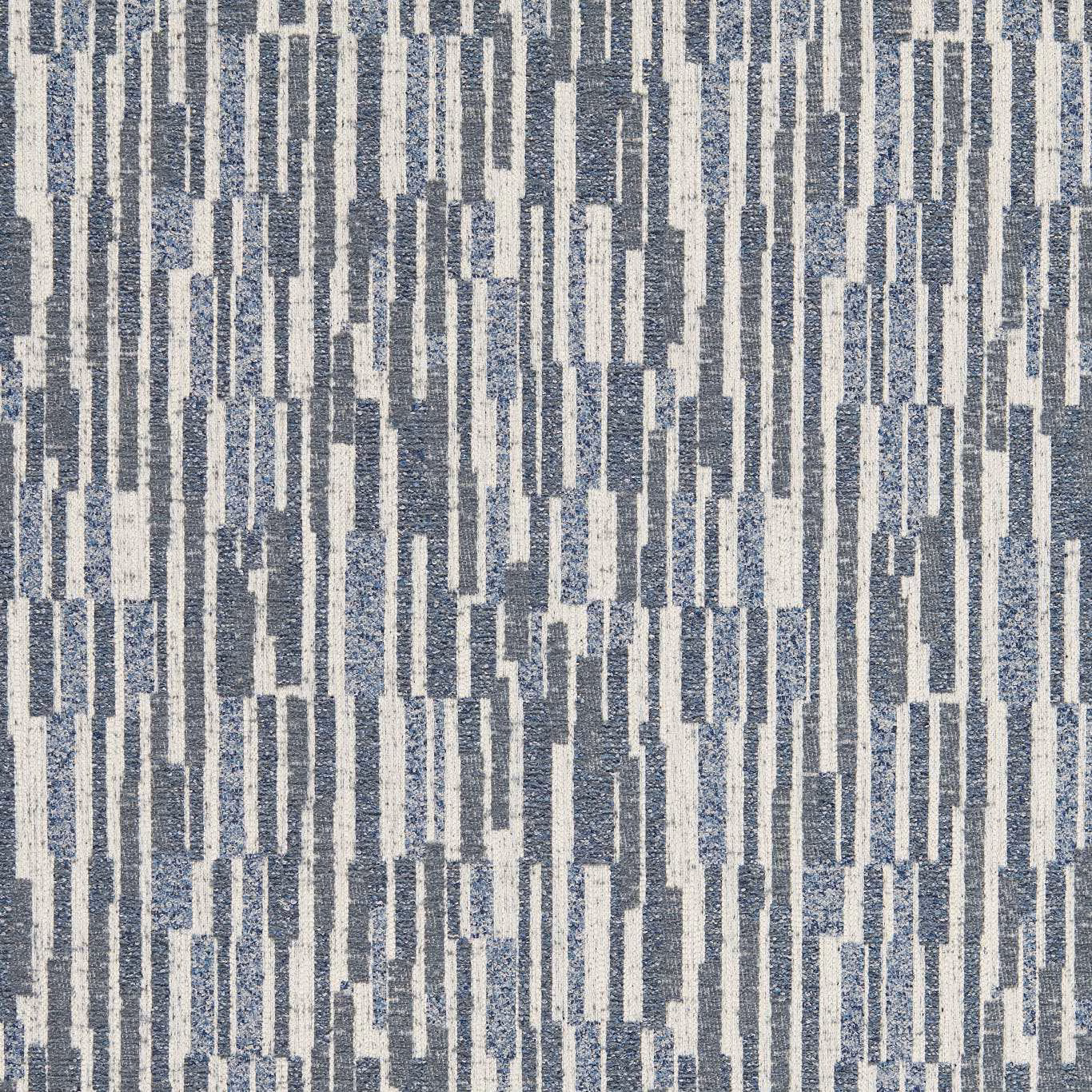 Ink-blue and ivory jacquard with broken vertical geometric stripes and dense woven texture