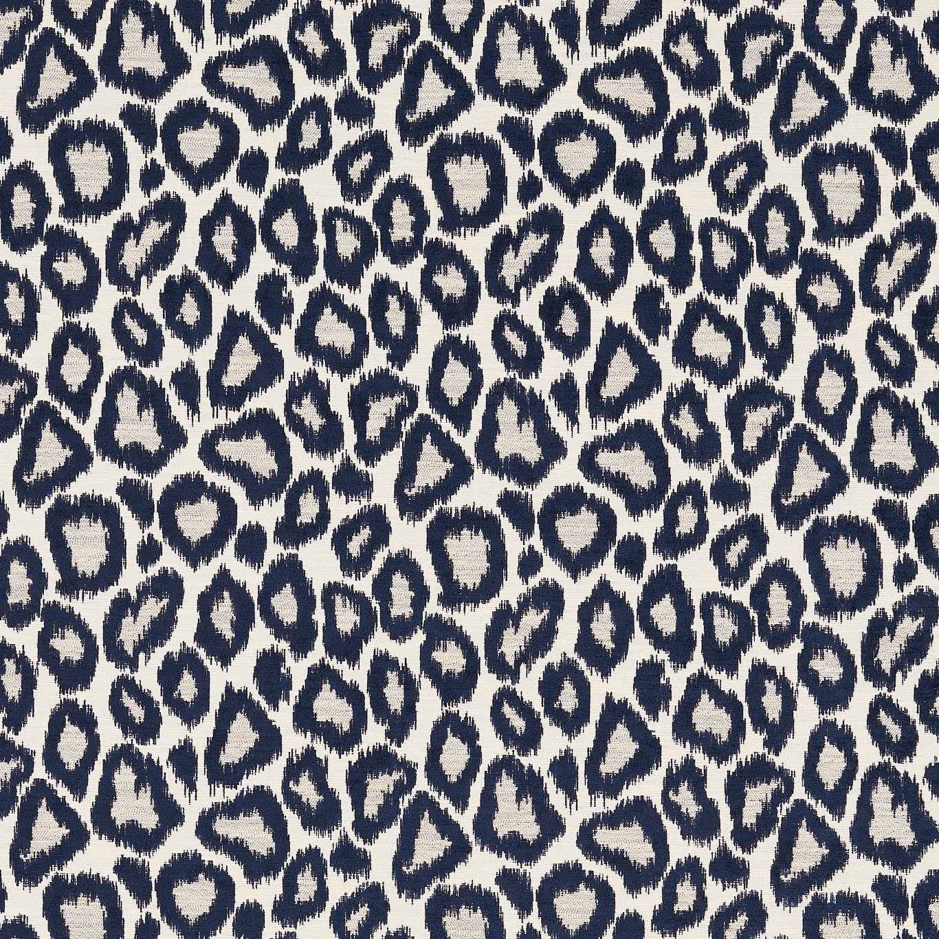 Ink navy irregular animal spots on an ivory, subtly textured woven ground