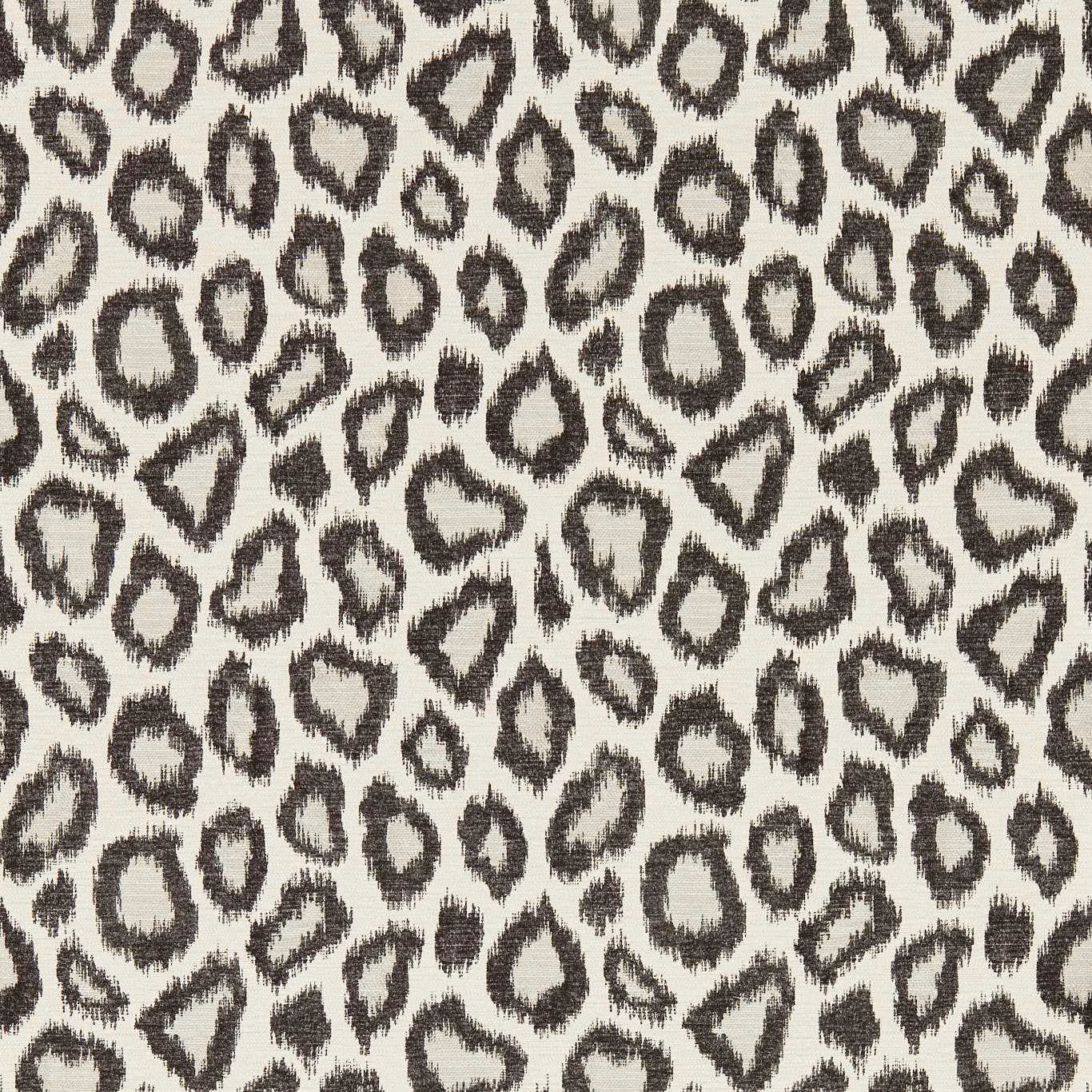 Ivory wallpaper with dense charcoal irregular animal spots and painterly edges
