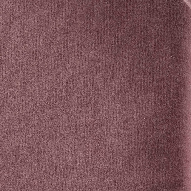 Close-up of dusty mauve heathered fabric with fine tonal weave and darker plum shading
