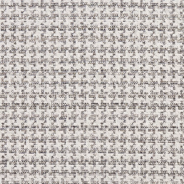 Pale woven upholstery with dense charcoal flecks and fine horizontal texture