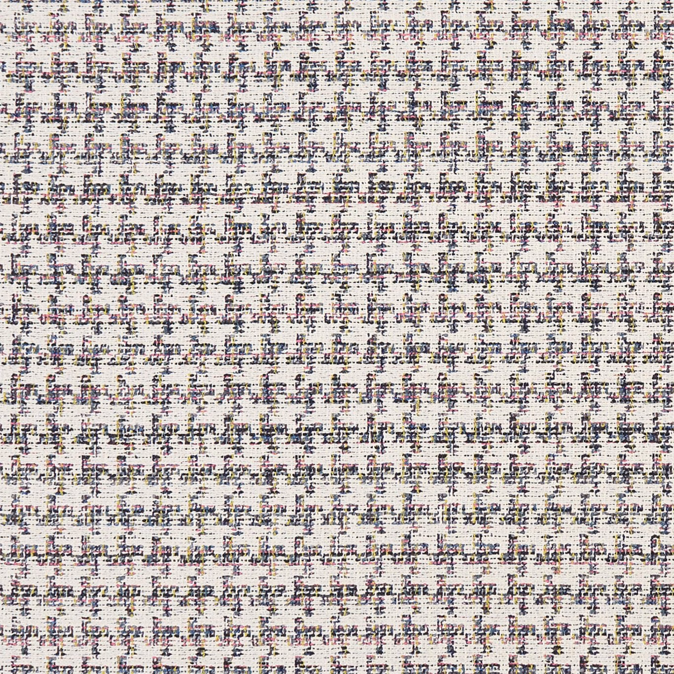 Ivory textile with dense navy, charcoal and blush flecks in a fine woven grid