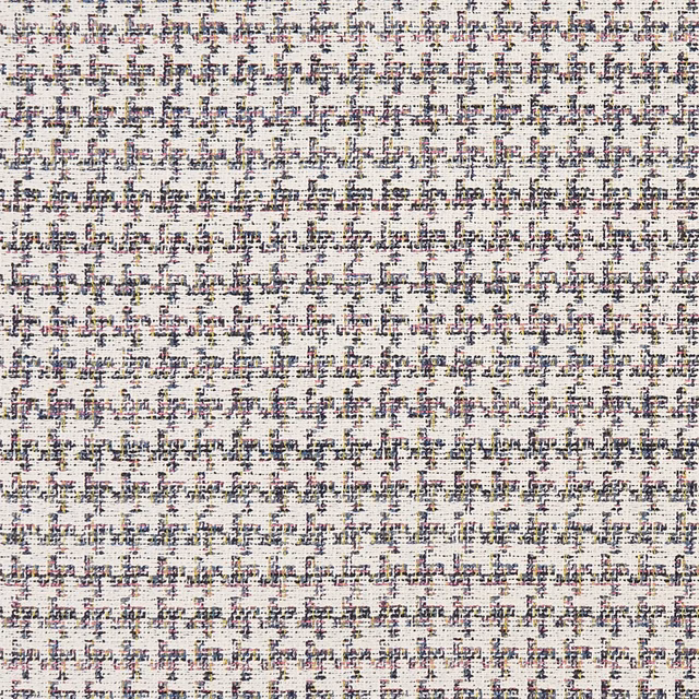 Ivory textile with dense navy, charcoal and blush flecks in a fine woven grid