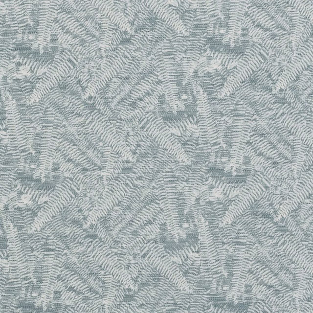 Pale eau de nil woven fabric with layered fern-like marks and soft texture