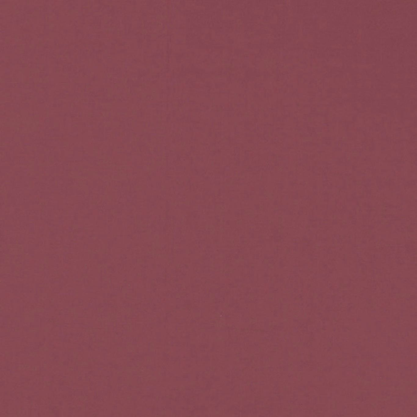 Close-up of plain Novara fabric in muted Bordeaux wine red with subtle woven texture