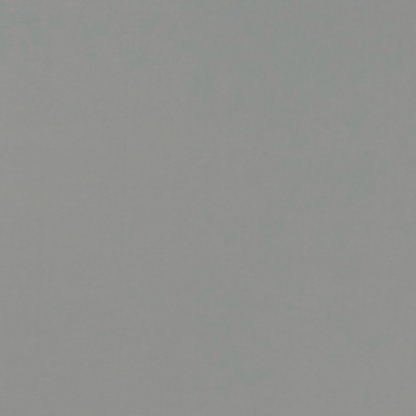 Cool gunmetal grey plain fabric with a subtle fine woven texture