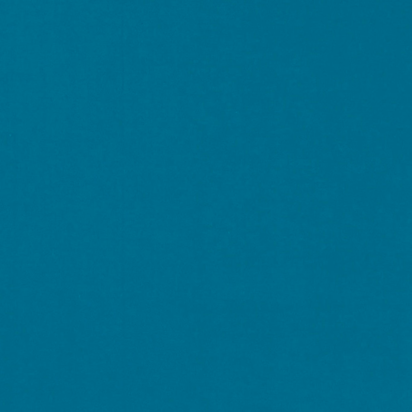 Close-up of deep peacock teal plain weave with a softly mottled surface