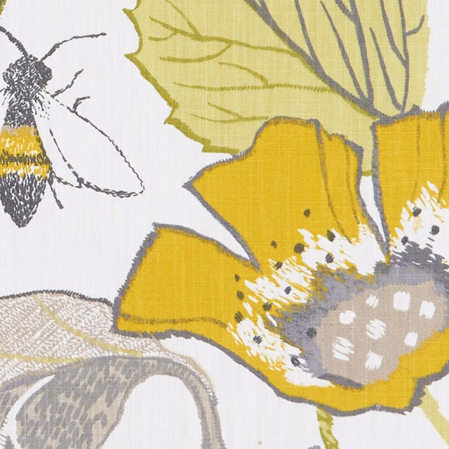 Chartreuse and mustard botanical blooms with charcoal outlines on a pale woven ground
