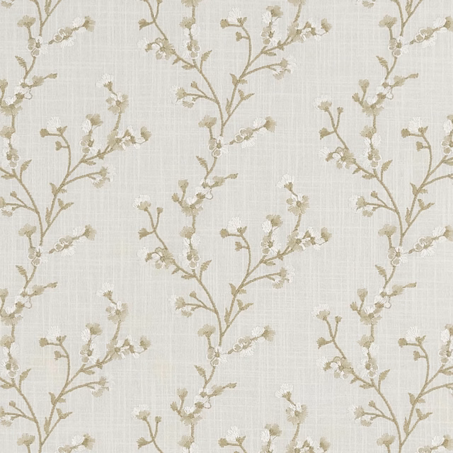 Ivory woven fabric with taupe branching stems and pale blossom sprigs
