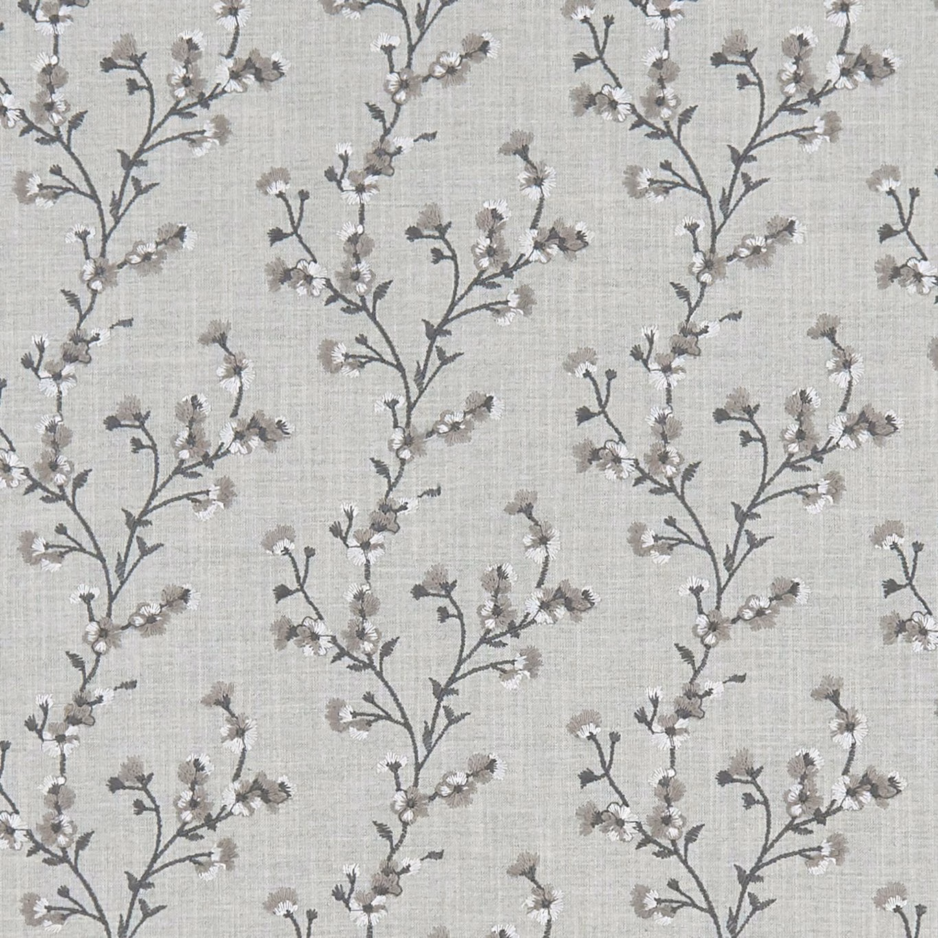Pale silver-grey woven fabric with branching charcoal stems and soft blossom sprigs
