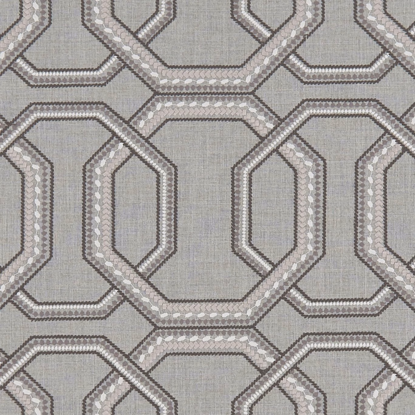Cool charcoal-grey woven textile with interlocking octagonal bands and pale flecked highlights