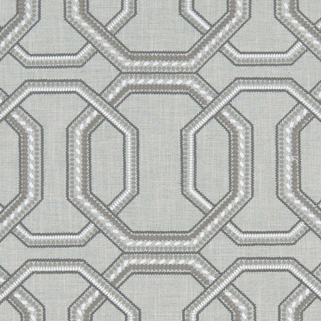 Cool silver-grey woven fabric with interlocking octagonal outlines and pale textured ground