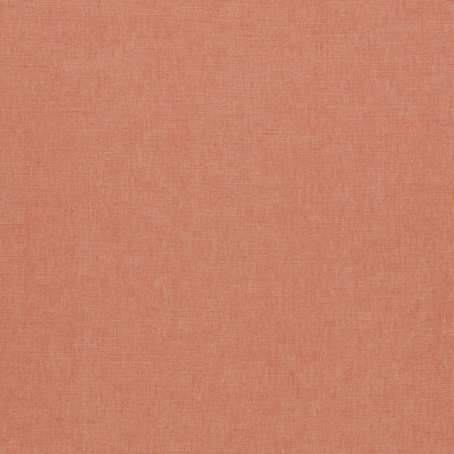 Warm coral pink fabric with a fine, softly crosshatched woven texture