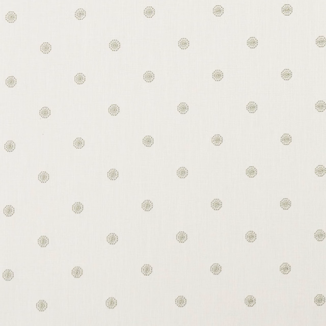 Ivory woven fabric with evenly spaced champagne rosette motifs and subtle texture