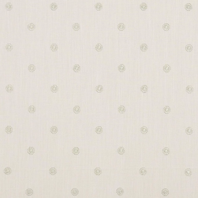 Champagne ivory woven fabric with small pale medallion motifs and subtle slub texture